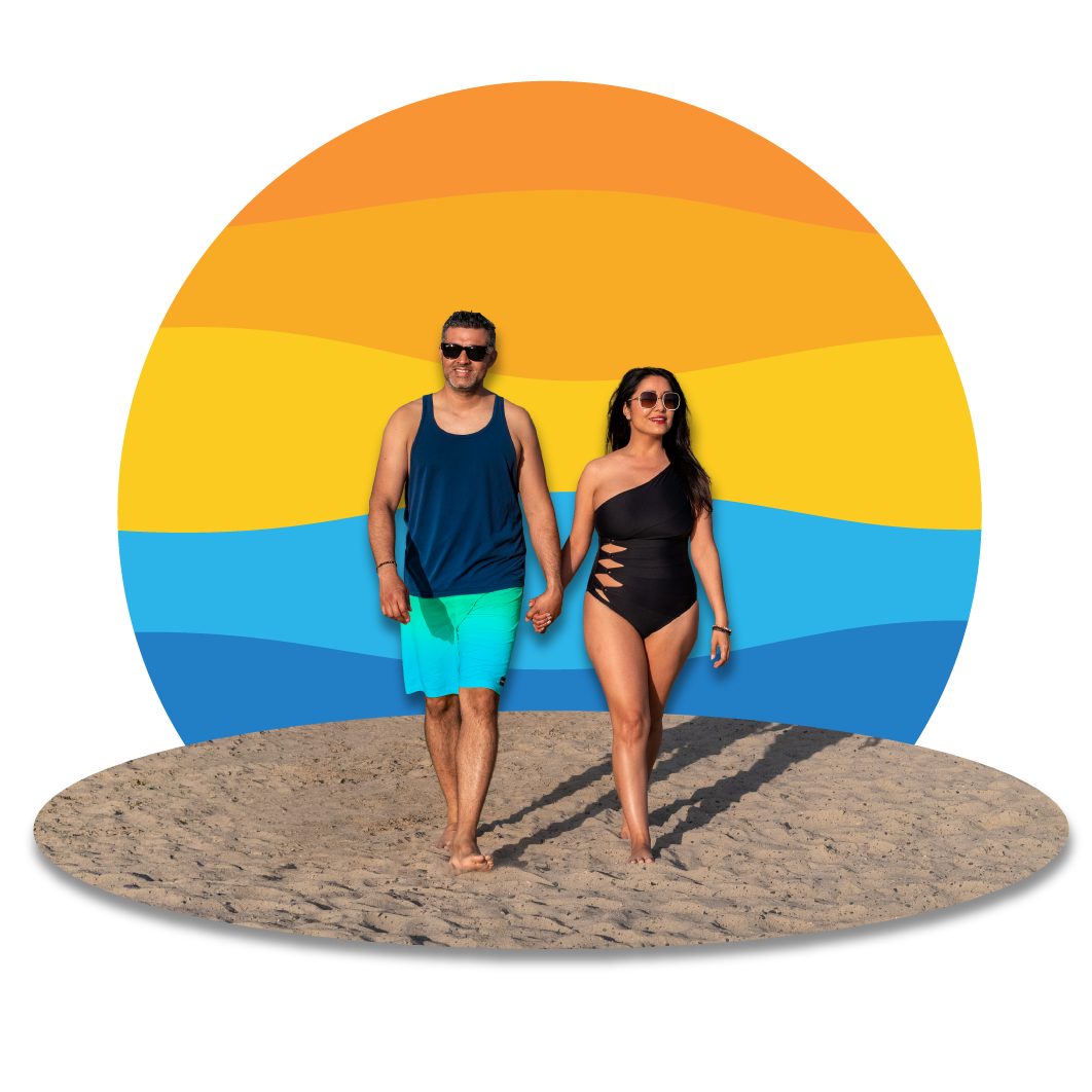 couple walking in the sand